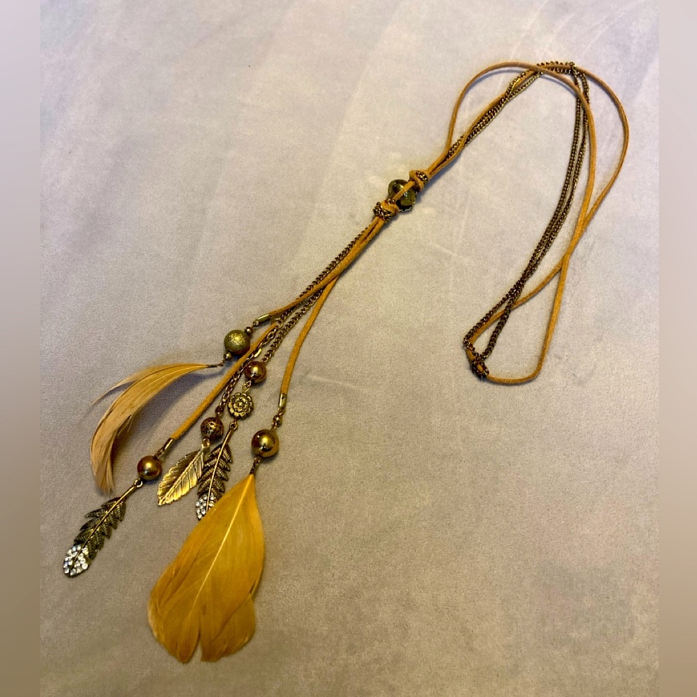 Gold feather and suede gold necklace!!